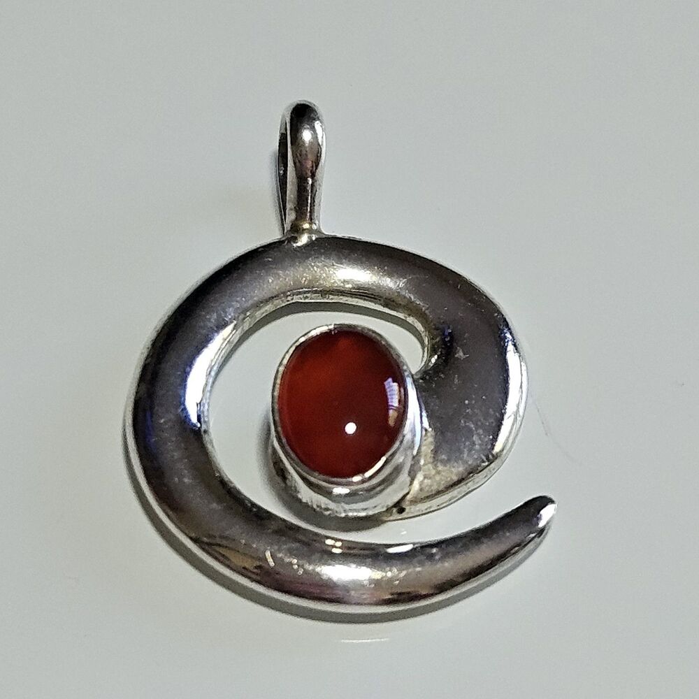 Vintage LD Sterling Silver Swirl Pendant With Oval Garnet